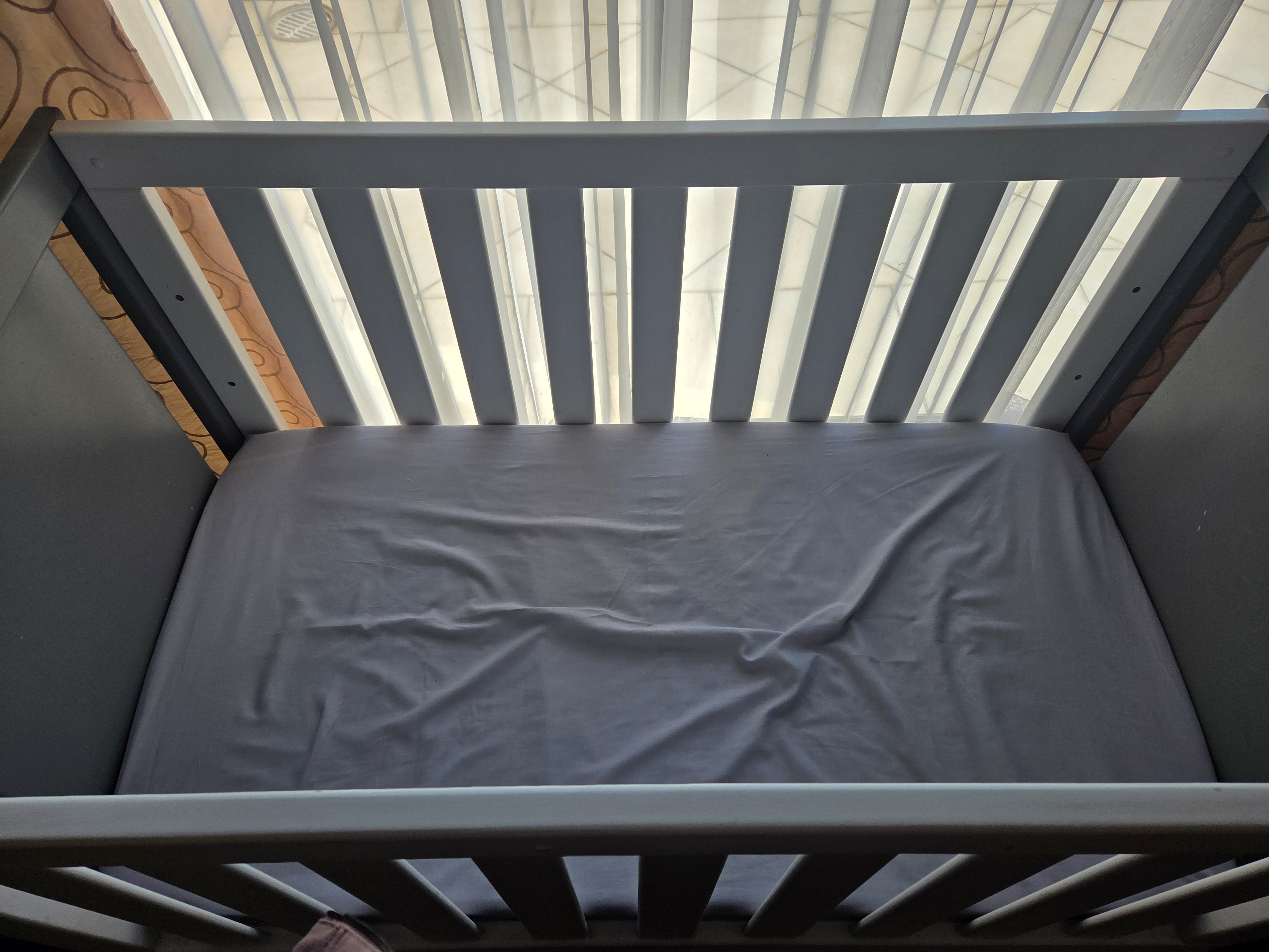 Grey and white large wooden cot with mattress*