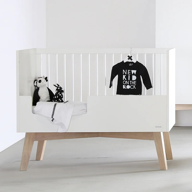 Kidsmill sixties oak cot bed 70x140 matt