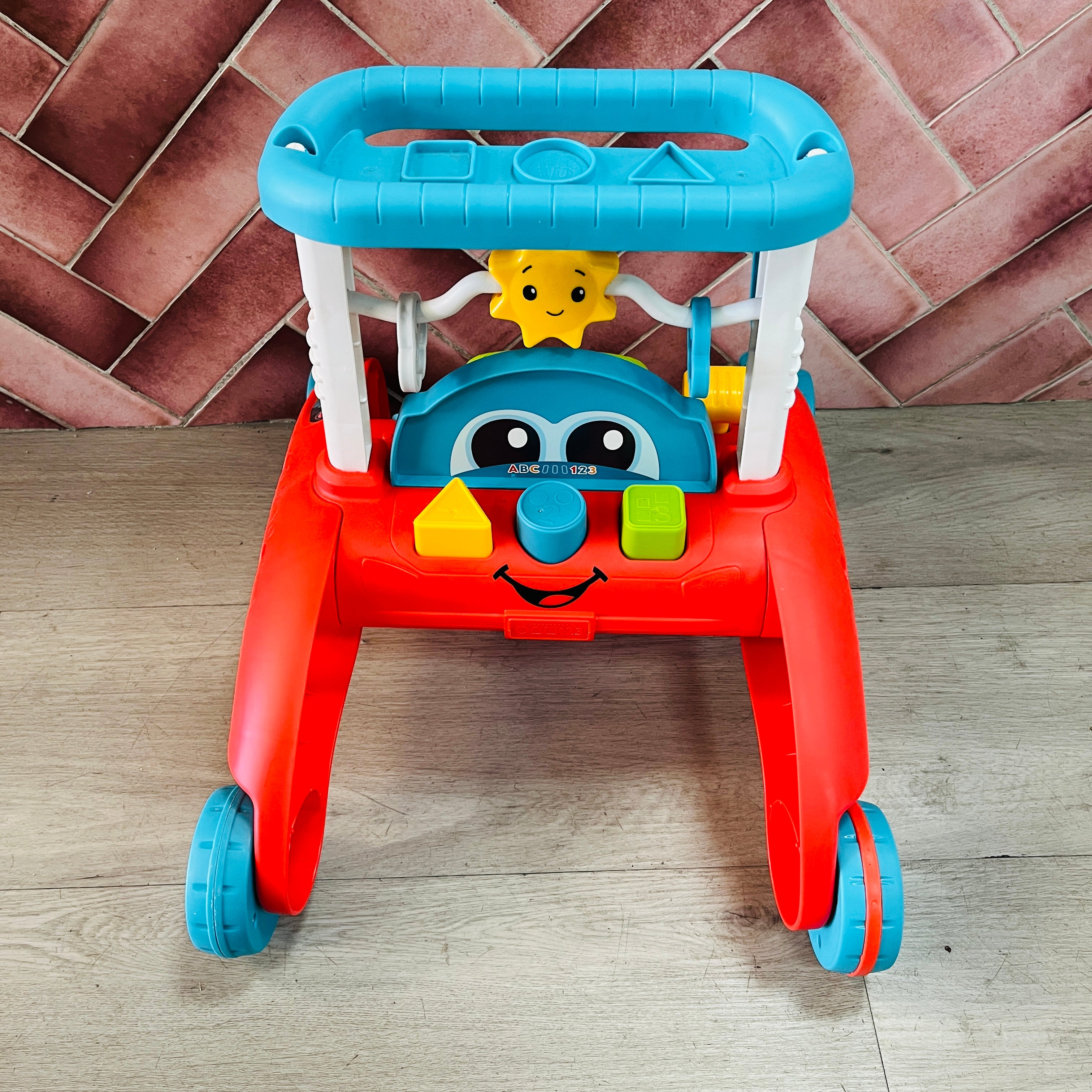 Fisher-Price 2-Sided Steady Speed Walker